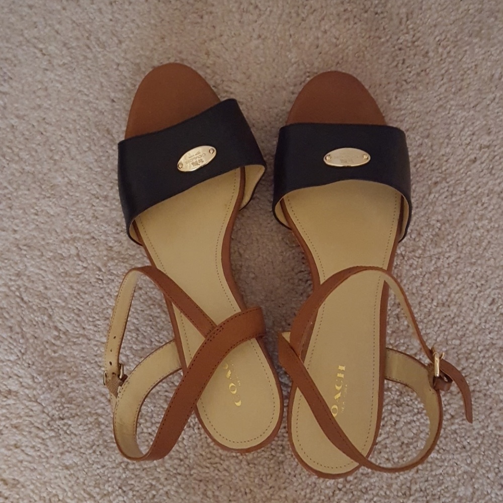 Coach sandals practically  new I wore them once.